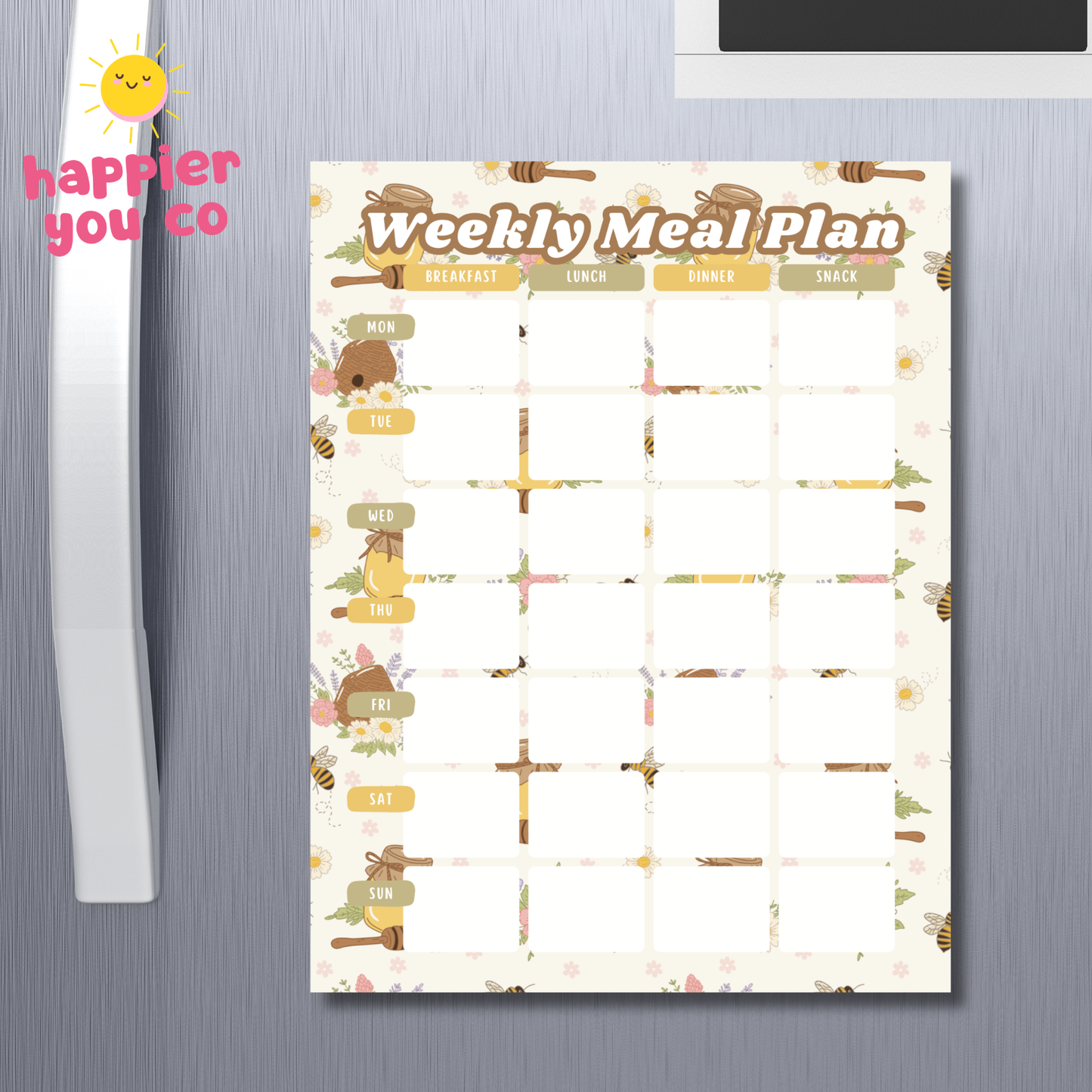 Weekly meal plan sheet on a refrigerator with 'happier you co' branding.