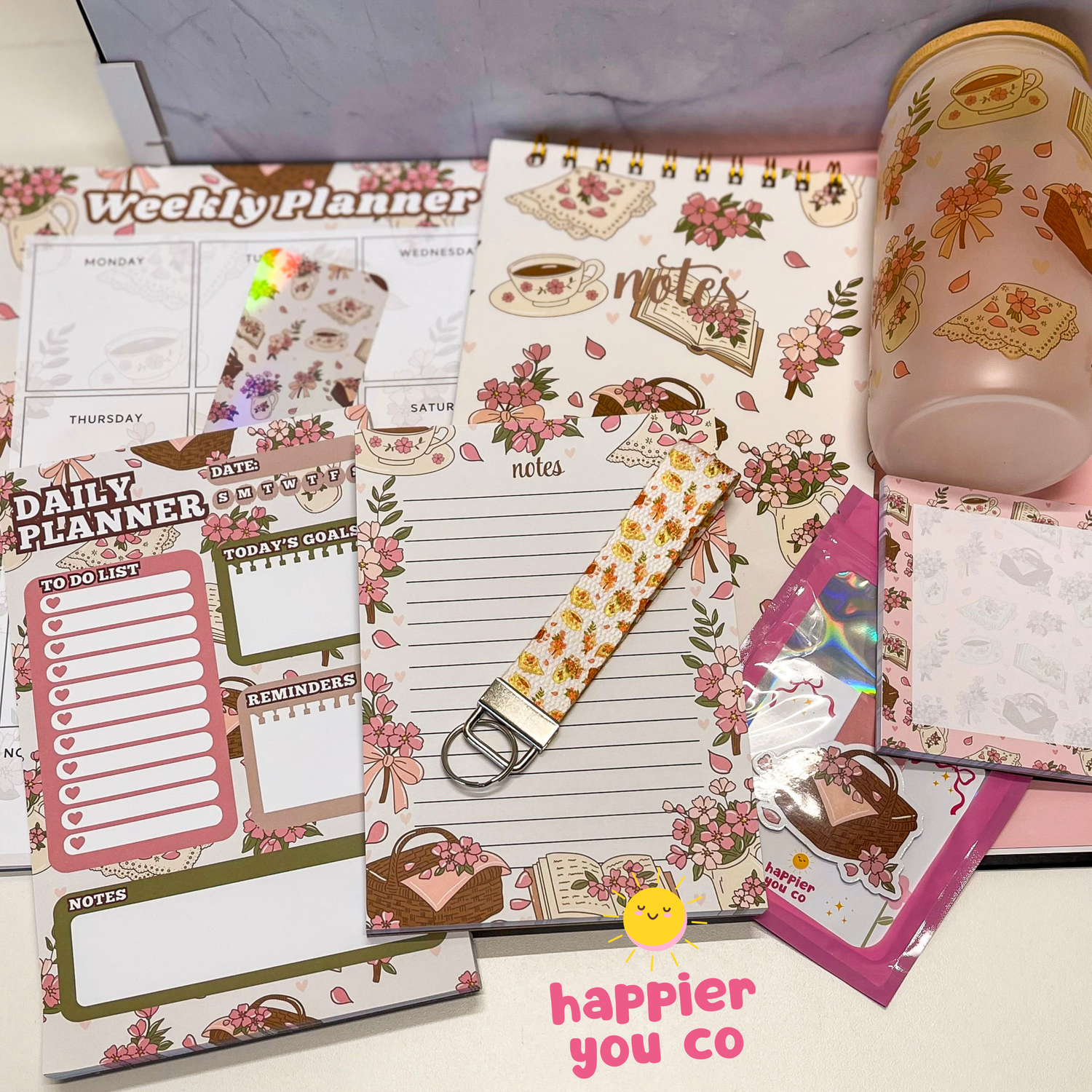 A variety of stationery products with the cherry blossom design