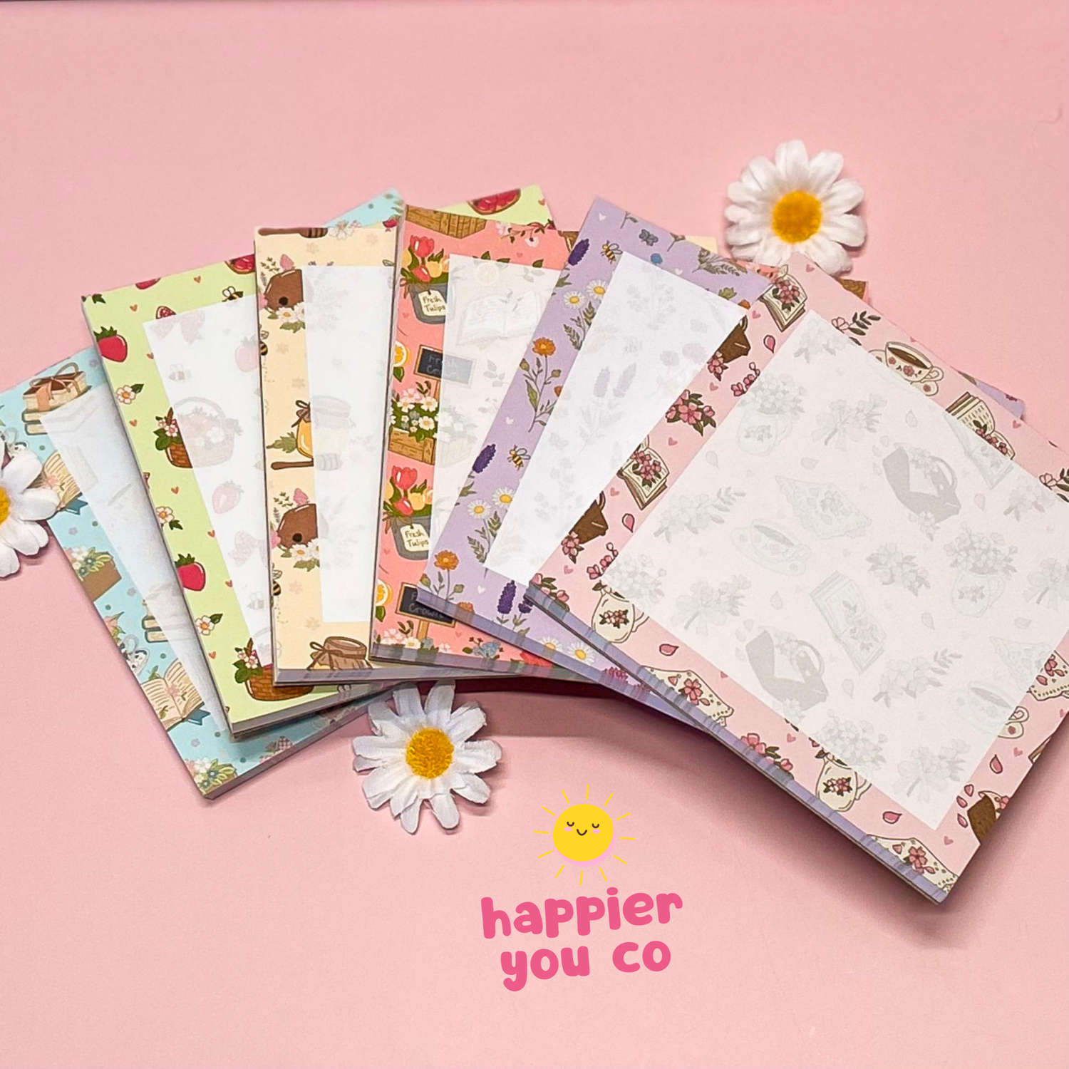 Memo square notepads with a variety of colorful and floral designs 