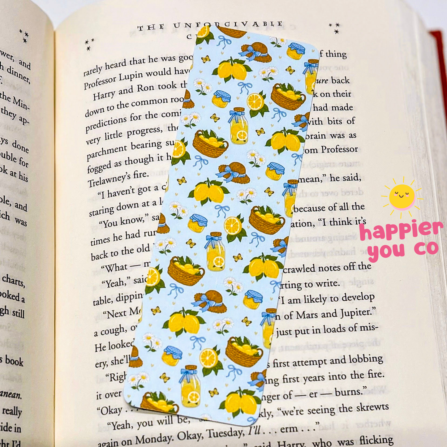 Decorative bookmark with lemon design on an open book
