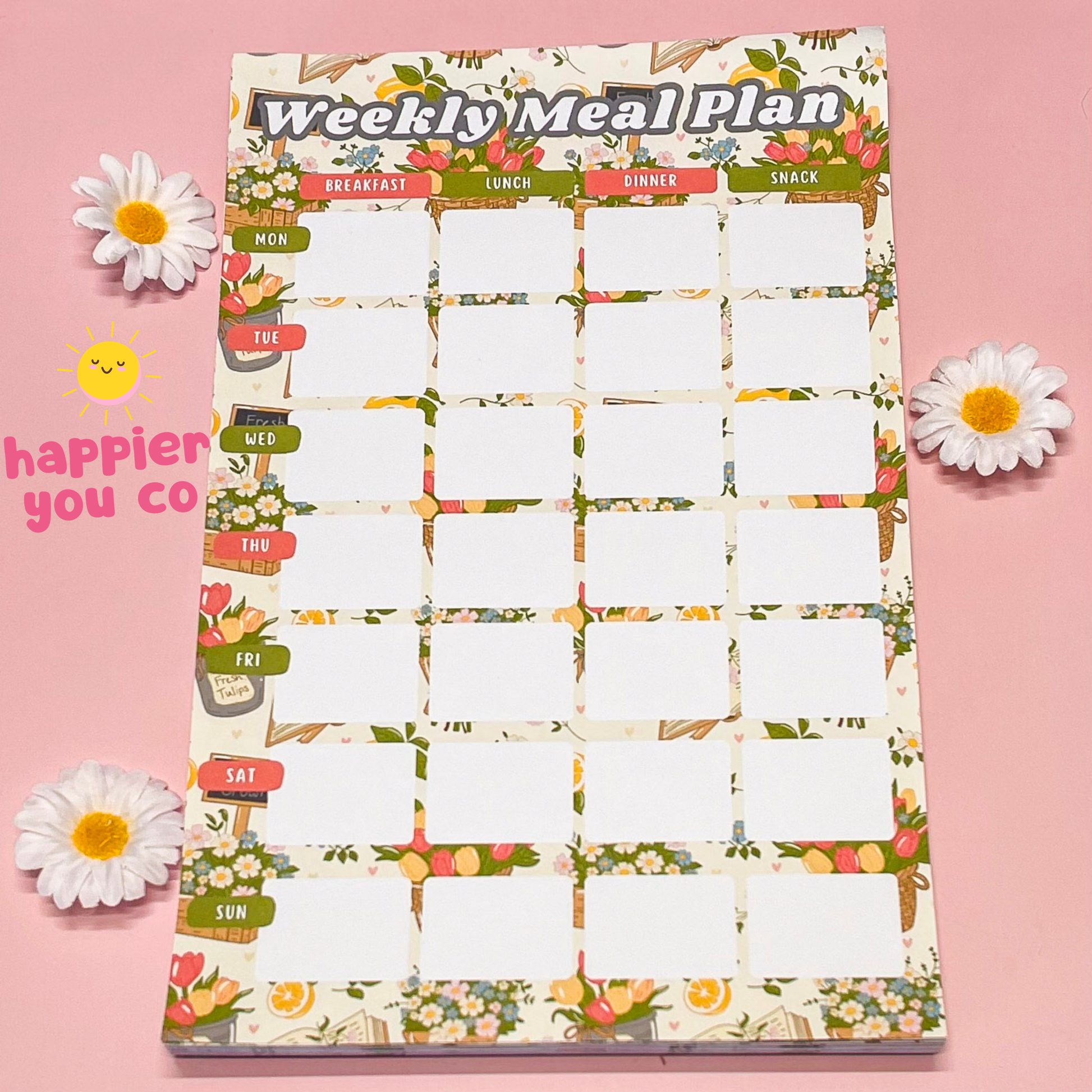 Weekly meal plan chart with floral design on a pink background