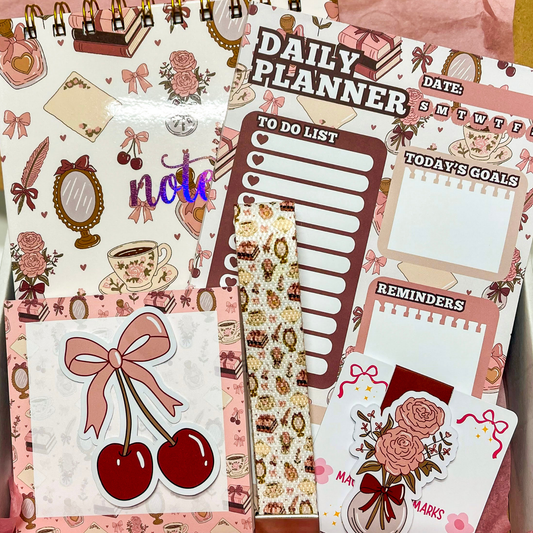 Collection of decorative planner stickers with various designs on a pink background.