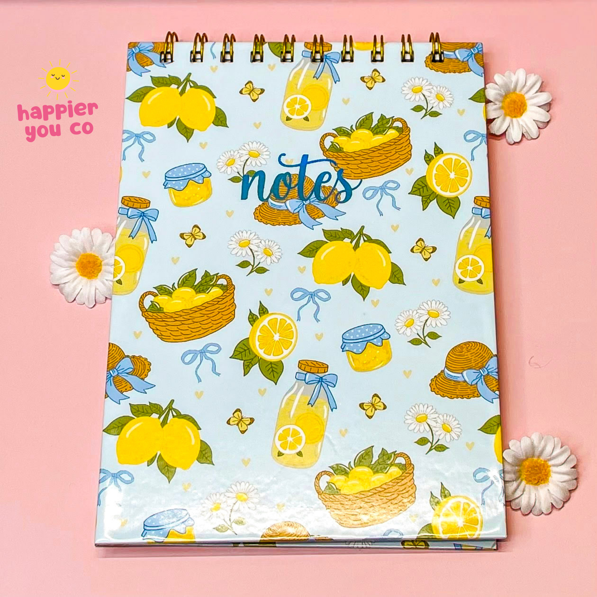 Notebook with lemon and jar pattern on a pink background