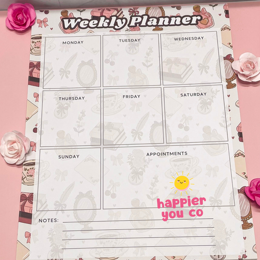 Weekly planner sheet with decorative border on a pink background