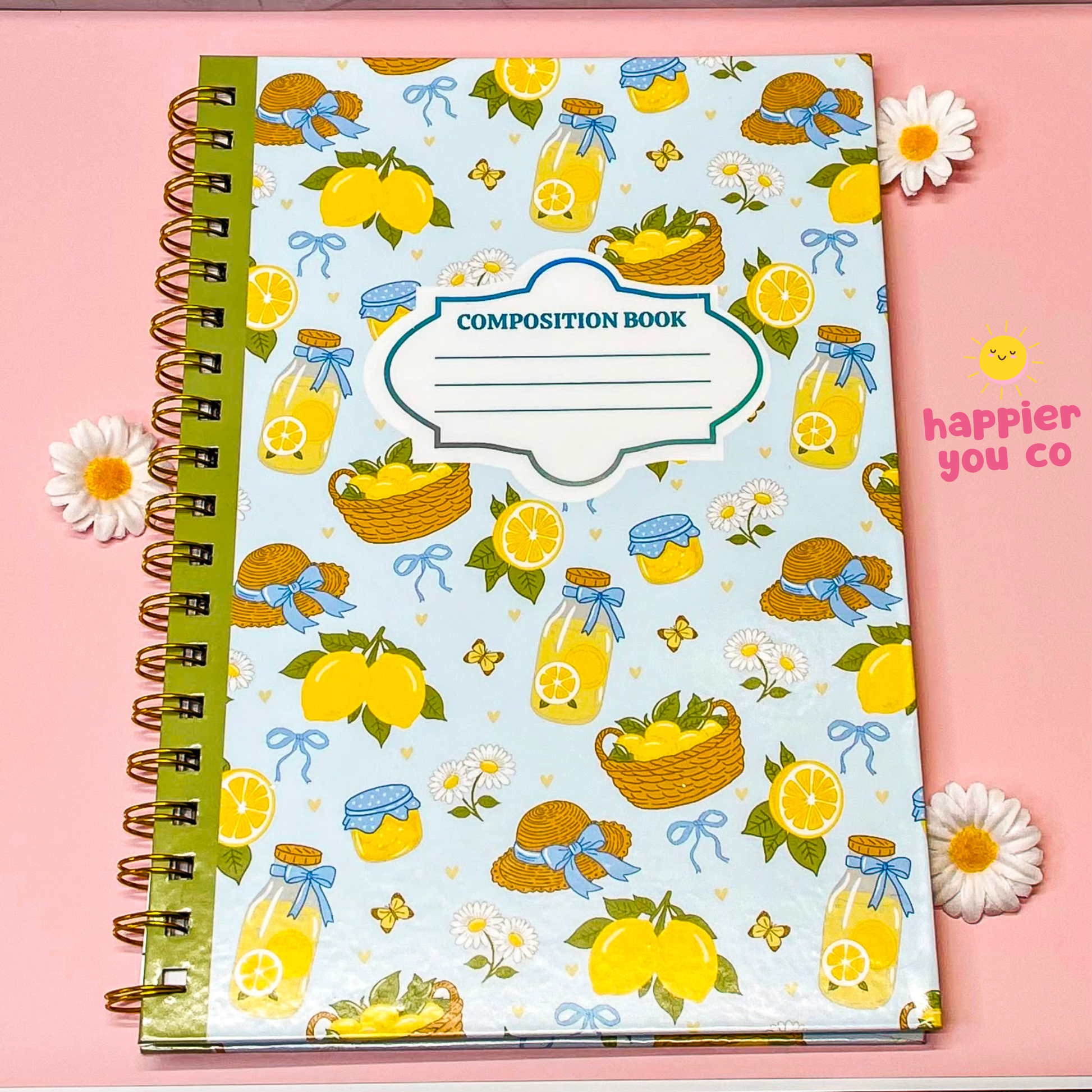 Composition book with lemon and jar pattern on a pink background
