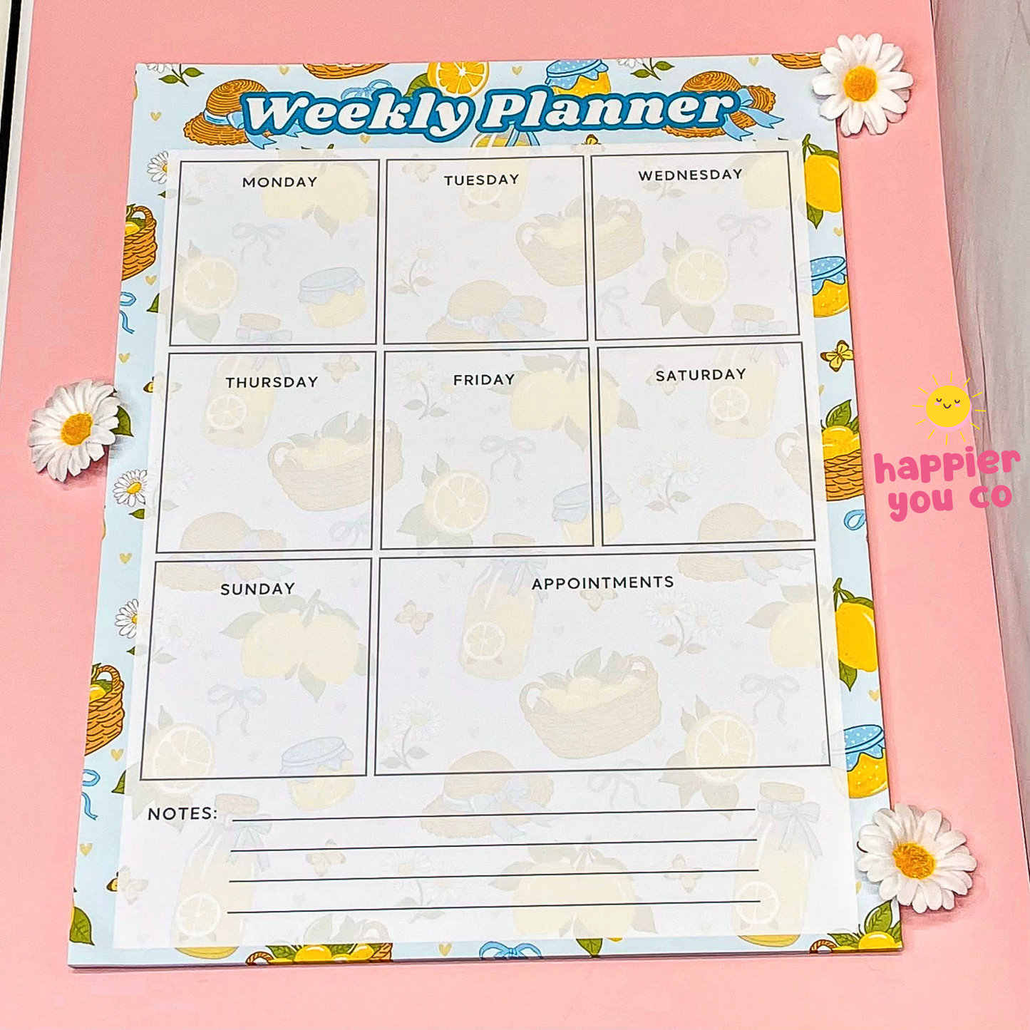 Weekly planner with cartoon design on a pink background
