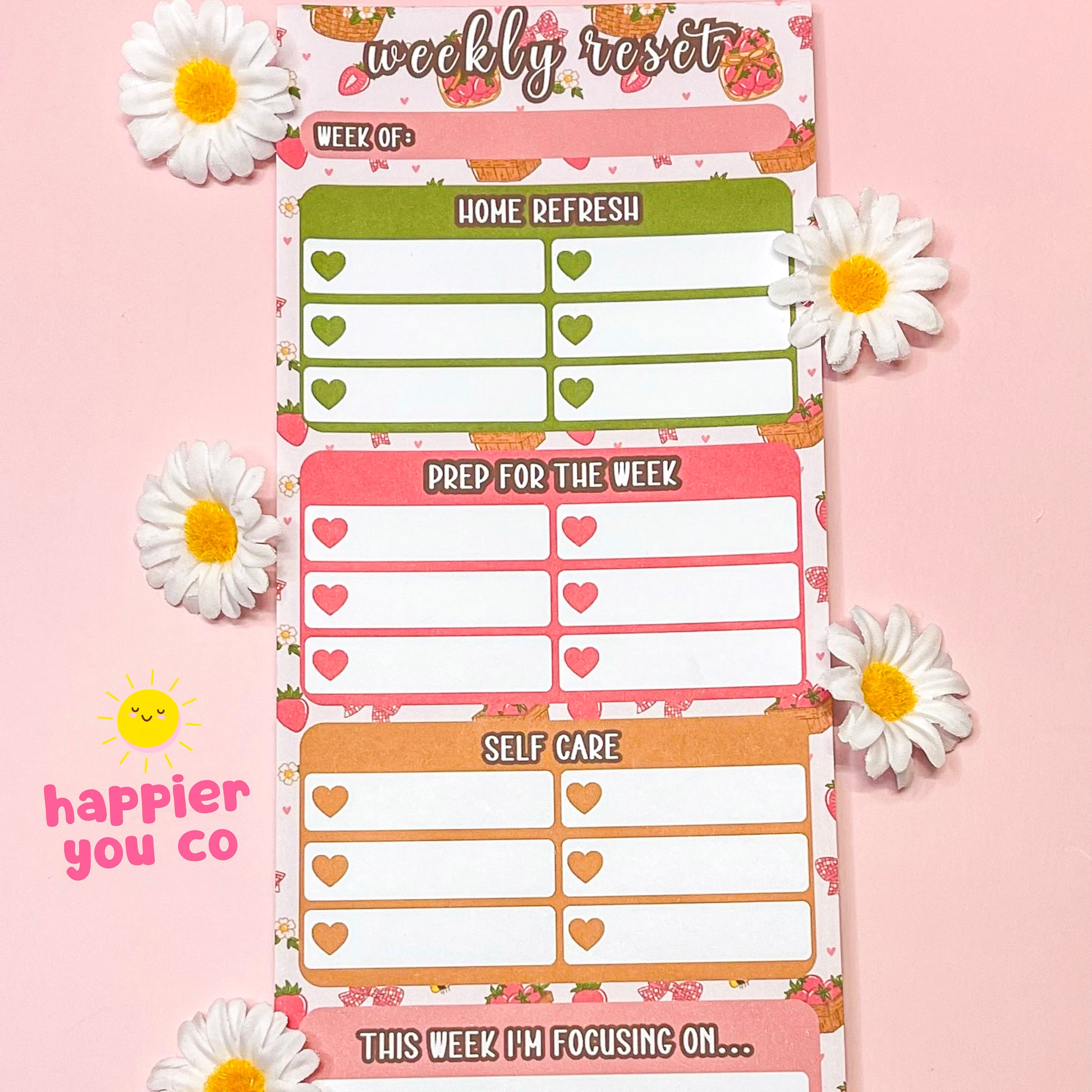 Weekly planner sheet with floral strawberry design on a pink background