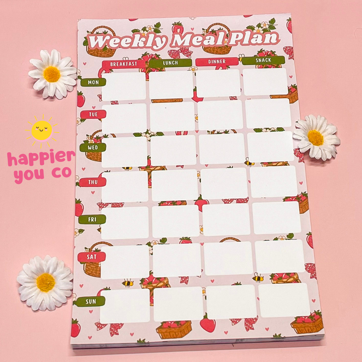 Weekly meal plan chart with floral design on a pink background