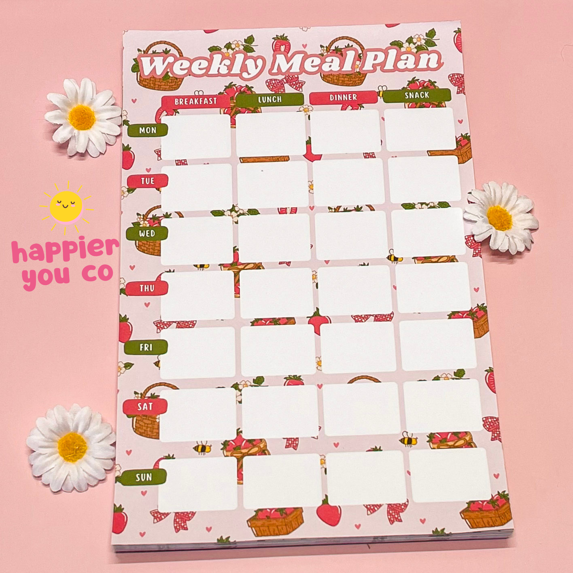 Weekly meal plan chart with floral design on a pink background