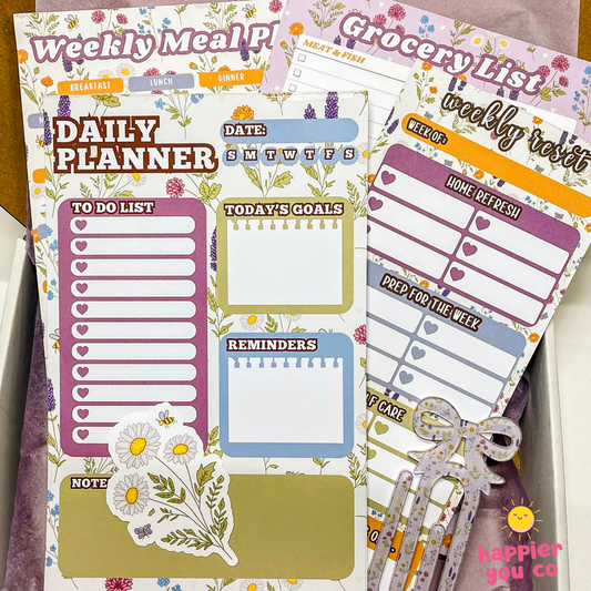 Set of planner stickers with floral designs and text on a white background